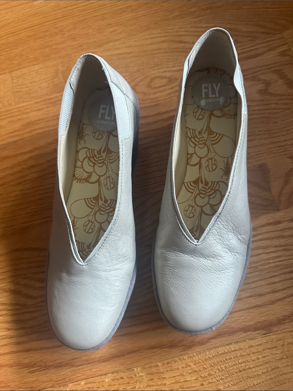 Fly London beige Leather Slip-On Flats with V-Cut